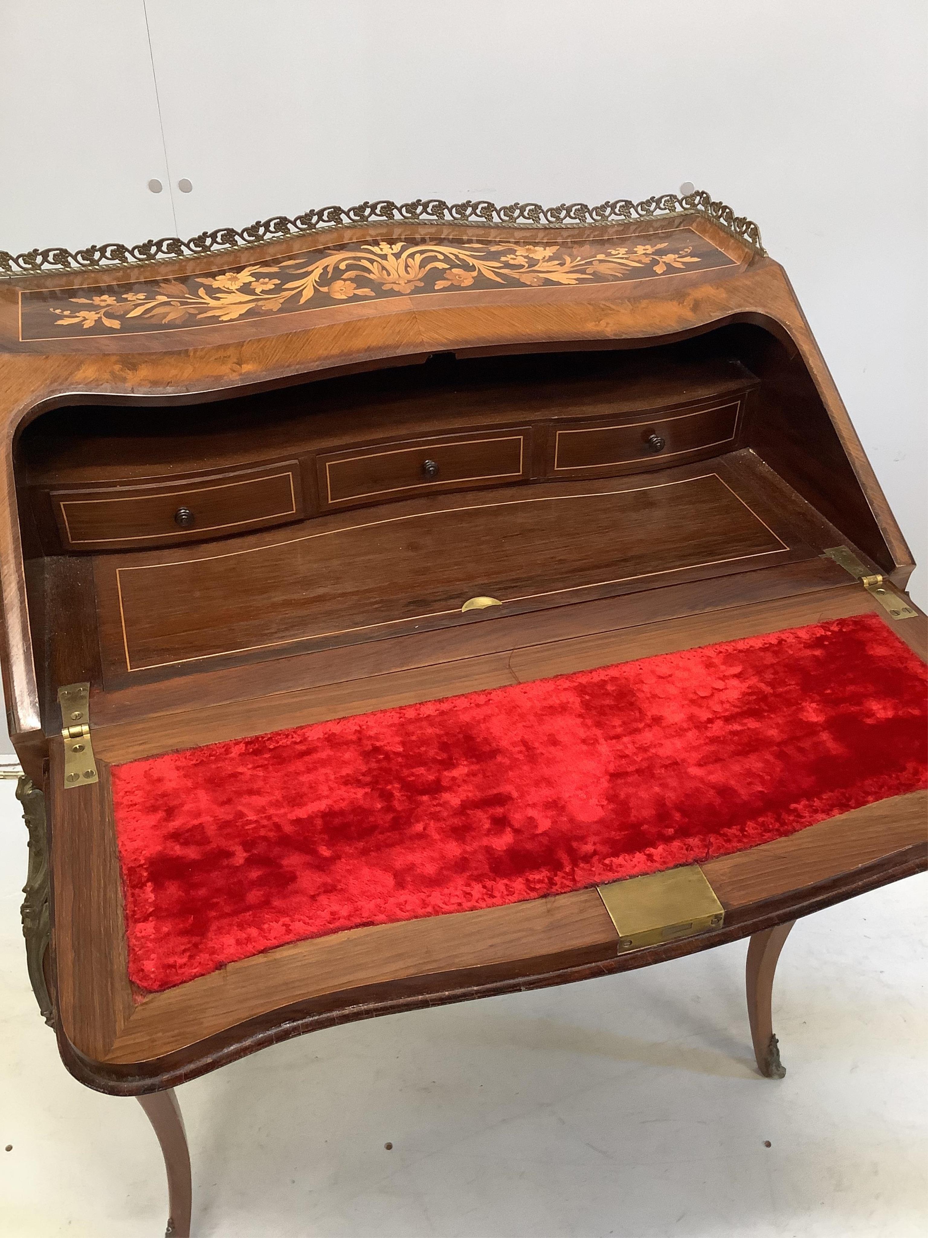 A marquetry inlaid rosewood bureau de dame, width 76cm, depth 47cm, height 96cm. Condition - good